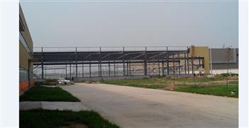 信然壓縮機(jī)徐州工廠又一車間開(kāi)始鋪墻面板